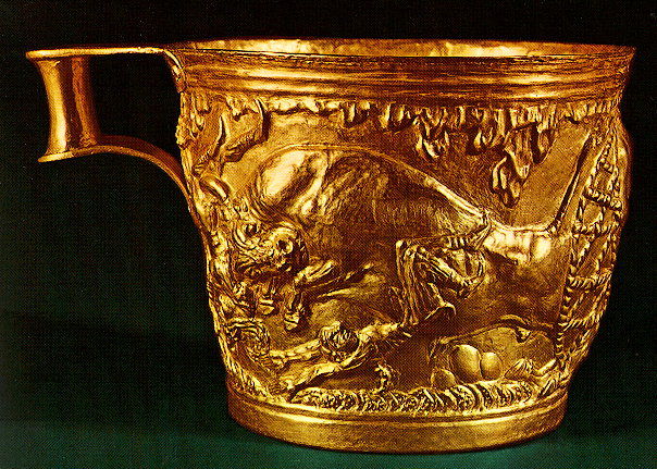 The Vapheio cups - The Vapheio cups. Pair of gold cups found in the tholos tomb of Vapheio in Laconia. The releif representations depict scenes of bull-chasing. They are unique masterpieces of the Creto-Mycenaean metalwork, dated to the first half of the 15th century B.C.