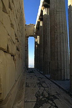 The northern pteron of the Parthenon. - Recent examination of this area by M. Korres has discovered cuttings in the marble floor for a small shrine and altar here, possibly indicating the location of an early cult of Athena on this side of the Acropolis. by Kevin T. Glowacki and Nancy L. Klein