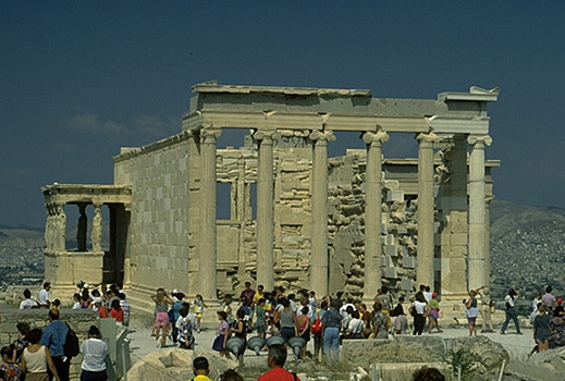 The east and south sides of the Erechtheion (with tourists for scale). - View from the east (and slightly to the south). by Kevin T. Glowacki and Nancy L. Klein