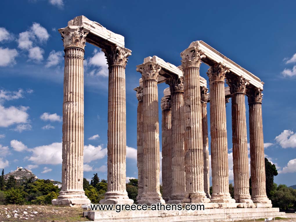 Zeus Temple - View of the temple of Zeus and Lycabetus Hill in the background by Ioannis Matrozos