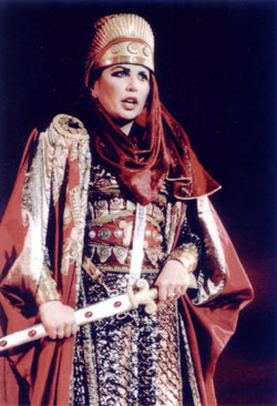 Power, Jelousy, Love, Madness are the four main issues Nabucco (Nabucodonosor), Giuseppe Verdi's masterpiece, deals with. This powerful opera with the masterly structure is famous for its melodies, such as the chorus Va pensiero. It is staged at Odeon of Herod Atticus (6/9 to 12) by a constellation of world renowned Greek and foreign artists in a grand production that bears the signature of the Greek National Opera. <br><br>

Nabucco was Verdi's breakthrough opera. The libretto was written by Temistocle Solera after the play Nabucodonosor by Anicet-Bourgeois and Francis Cornue. <br><br>

First performed in La Scala, Milan, in March 1842, today the play is still best known for the chorus Va, pensiero (a paraphrase of Psalm 137), sung by the Hebrew slaves as they await their fate at the hands of the Babylonian tyrants. At the time of its first performances, the piece soon became a popular anthem for the Italian people, expressing their own longing for political freedom from Austria. When Verdi's coffin was carried to its final resting place a month after his death in 1901, the crowd of over 25,000 people along the route spontaneously began singing this stirring chorus. <br><br>

The opera is designed by Verdi as a lesson in statecraft, and in the emotional qualities necessary for leadership. Set in Biblical times, in the 6th century B.C., it is the magnificent story of the conquest of the ancient Hebrews and their exile by the waters of �abylon. <br><br>

Nabucco, the king of Babylon, has tremendous power and his cruelty is relentless. But even more dangerous is Abigaille, the child of slaves who stops at nothing to gain the throne. Revenge, retribution and, ultimately, salvation make Nabucco an unforgettable experience. <br><br>

The ID of the performance <br>
Conductor: Loukas Karytinos <br>
Stage director: Spyros Evangelatos <br>
Sets - Costumes: Agni Doutsi <br>
Chorus Master: Fani Palamidi <br>
Main roles interpreted by: Alberto Mastromarino - Boris Stachenko (Nabucco), <br> Maria Guleghina - Lucia Mazzaria (Abigaille), Francesco Ellero D’Artegna - Andrea Silvestrelli (Zaccaria), Stamatis Beris - Dimitris Sigalos (Ismaele), Viktoria Maifatova - Marita Paparizou (Fenena) and others.

