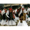 The 185th anniversary of the March 25 Greek national Independence Day, which celebrates the start of the Greek revolution against Ottoman rule in 1821, was celebrated with pomp throughout Greece on Saturday, culminating with a parade by the Armed Forces in central Syntagma Square in Athens in the presence of President of the Republic Karolos Papoulias. March 25 is a dual holiday, as the Annunciation of the Virgin Mary is also celebrated on that day. <br><br>

    Today we celebrate the biggest historical event of modern Greece. A people almost unarmed, but with a flame in its heart and with a passion for freedom, rose up against an empire and gained its freedom, Papoulias said after the parade. <br><br>

    This gives us the message that freedom is not given, it is conquered. Today, the people and the Armed Forces are the guarantee for the progress of Greece, for its peaceful coexistence with all the peoples of the region, for peace in the region, which is necessary, the President continued.<br><br>

    He also expressed conviction that the Greek people, with their patriotism, and the Armed Forces, with their preparedness, would do their duty. <br><br>

    Prime minister Costas Karamanlis, in a statement, said that the March 25 holiday found the Greeks determined to make reality their visions for a strong and prospering Greece, for a Greece that was a factor of peace and stability in the wider region, for a society of cohesion and solidarity. <br><br>

    The premier added that we are in the middle of as great collective effort. A difficult effort which, however, we must complete. <br><br>

    Main opposition PASOK leader George Papandreou said that the March 25 anniversary was always timely, as it embodies the struggles and visions of so many generations of Hellenes...Visions for social justice, freedom, democracy, for a society of solidarity. We hold this vision today, too, and are dedicated to those goals. <br><br>

    Before the parade, a doxology was held at the Athens Metropolitan Cathedral, officiated by Archbishop Christodoulos of Athens and All Greece, and attended by the President, the country's political leadership, the Armed Forces leadership, and the leadership of the Security Corps. <br><br>

    The doxology was attended by President Papoulias, premier Karamanlis, main opposition leader Papandreou, representatives of the political parties and the local administrations, former Presidents Costis Stephanopoulos and Christos Sartzetakis, the Armed Forces and Security Corps leaderships, and the leadersnip of the country's higher and supreme courts. <br><br>

    President Papoulias was greeted with full military honours at Syntagma Square after the doxology, where he laid a wreath at the Tomb of the Unknown Soldier outside the parliament building.
