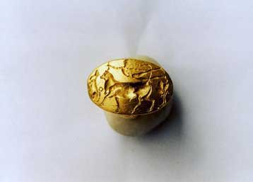 The long-lost 'Theseus Ring,' a gold ring found in the Plaka district of Athens in the 1950s and generally dismissed as a fake, has been identified by Greek archaeologists as a genuine 15th century BC artifact, reports said Wednesday. <br><br>

The Greek press had reported the discovery of a gold signet ring, with dimensions 2.7 x 1.8 cm dating from the Minoan period, and the National Archaeological Museum wanted to purchase it for 75,000 euros from the woman who owned it. <br><br>

There was a huge debate about its authenticity until a panel of experts from the Culture Ministry declared the piece to be genuine. <br><br>

The ring, which depicts a bull-leaping scene, is believed to come from the area of Anafiotika in the Athens ancient city centre of Plaka. The scene also includes a lion to the left and a tree to the right. <br><br>

According to ancient Greek mythology, Prince Theseus was the son of King Aegeus of Athens. During this period, the Minoans under the leadership of King Minos, who lived on the island of Crete, had a very strong navy and often attacked various Greek cities, including Athens. <br><br>

King Aegeus had an agreement with King Minos that if Minos would leave Athens in peace, Aegeus would send seven Athenian boys and seven Athenian girls to Crete every nine years, to be eaten by a monster that lived on Crete, the Minotaur. <br><br>

Determined to slay the monster, Theseus joined the children on the next voyage despite pleas from his father. King Aegeus made Theseus promise to change the sails on the boat from black to white if he managed to come home alive. <br><br>

After killing the Minotaur and sailing back towards Athens near Sounion, Theseus had forgotten to change the sail from black to white. When King Aegeus saw the black sail he thought Theseus was dead and jumped off a cliff, killing himself. 