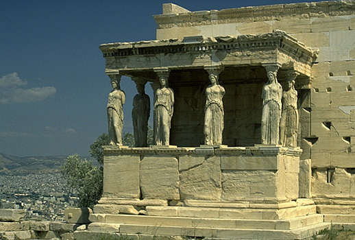 The South Porch or Caryatid Porch of the Erechtheion. Caryatids (or Karyatids) are female figures used as architectural supports in place of columns -- a feature associated with Ionic architecture. - The Roman architect Vitruvius wrote that Caryatids were supposed to represent the women of the southern Greek town of Caryae which supported the invading Persian force in 480 BC. After the Persian Wars, the other Greek states forced them to carry objects