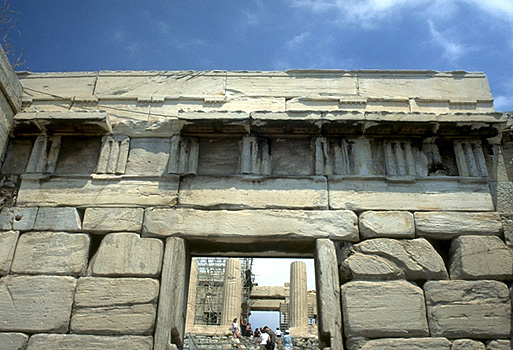 The Beule Gate (The Late Roman entrance to the Acropolis). - Built into the wall above the doorway are remains of the choregic monument of Nikias.